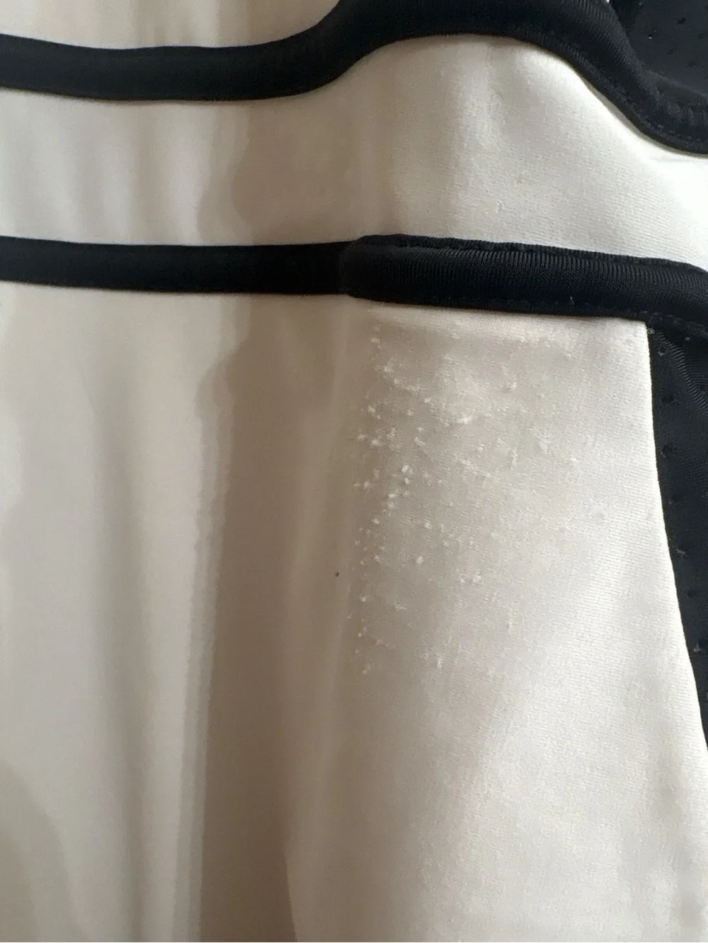 Woman’s White and Black Zip-Front One-Piece Swimsuit